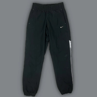 vintage Nike trackpants {M}