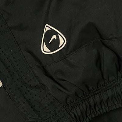 vintage Nike Manchester United trackpants {S}