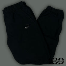 Load image into Gallery viewer, vintage Nike trackpants {M}
