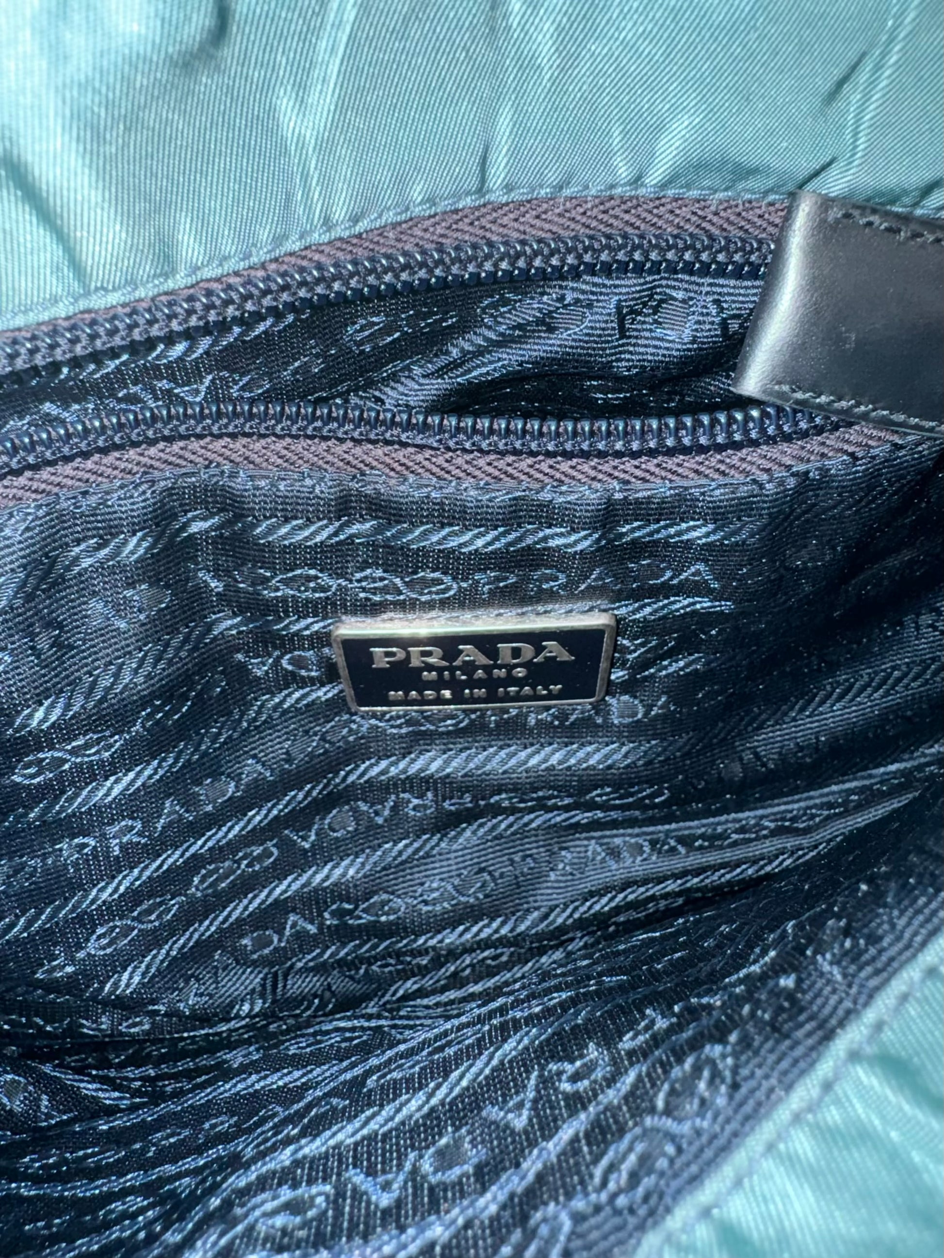 vintage turquoise Prada slingbag