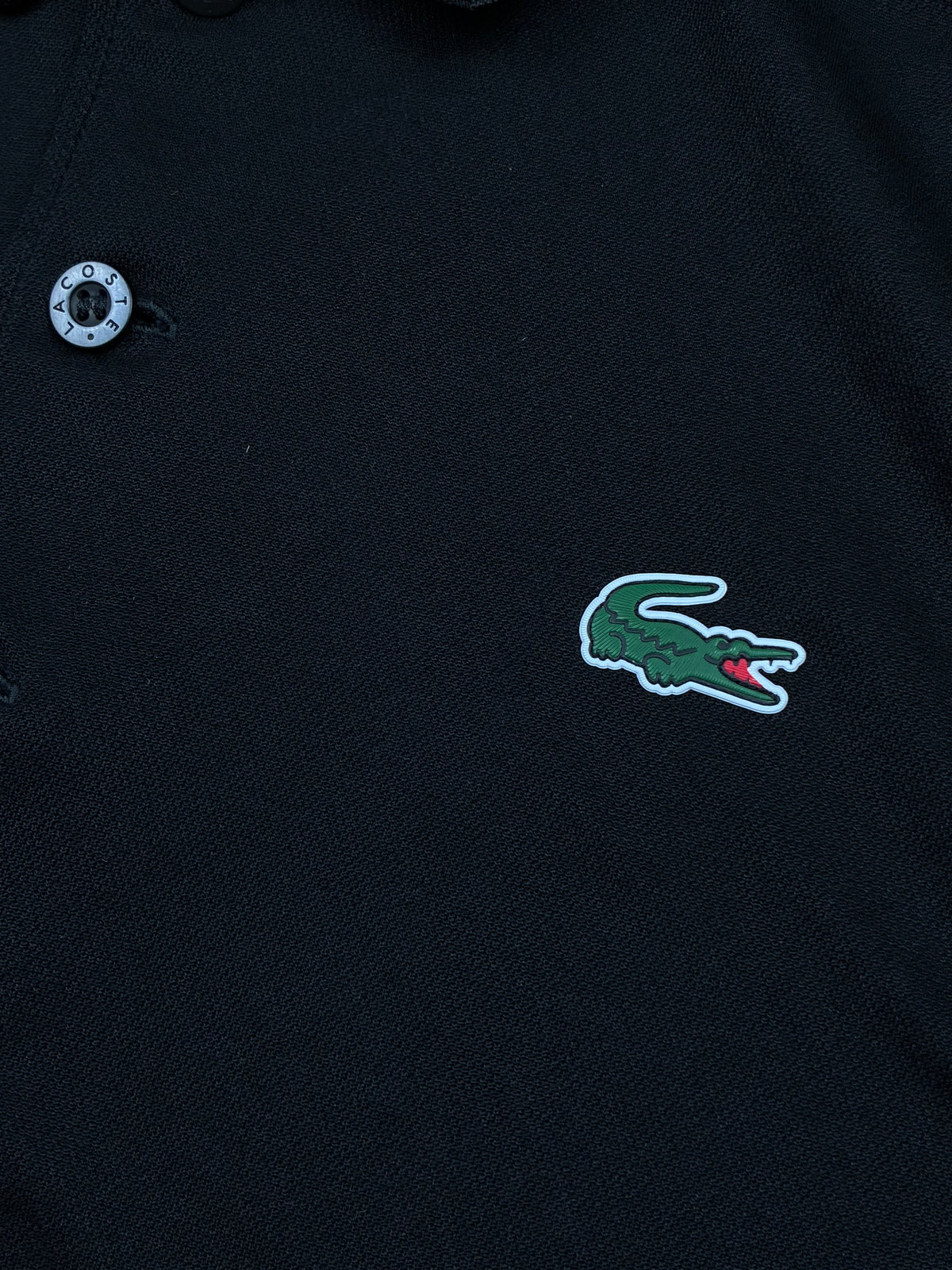 black Lacoste polo {XS}