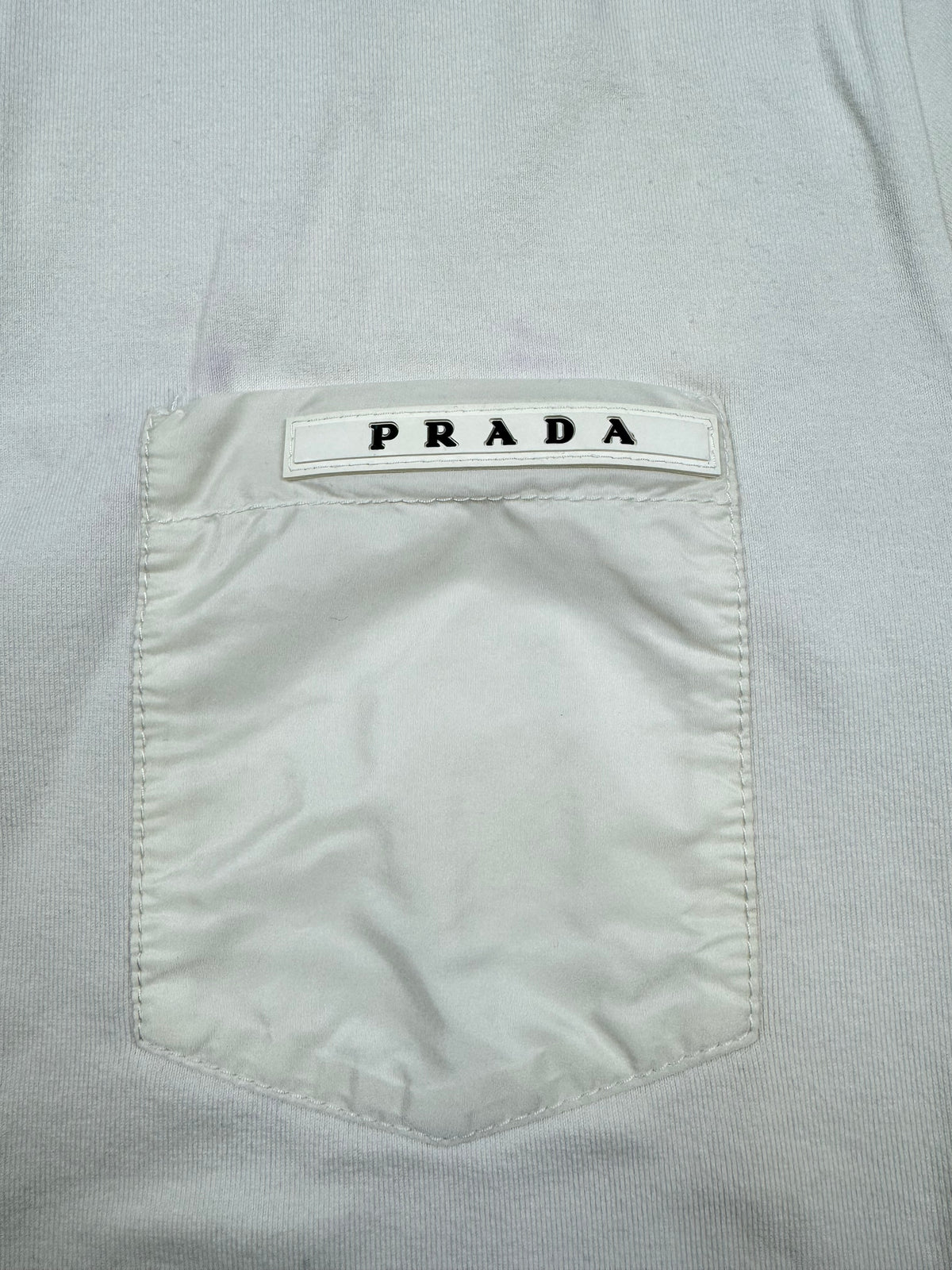 white Prada polo {L}