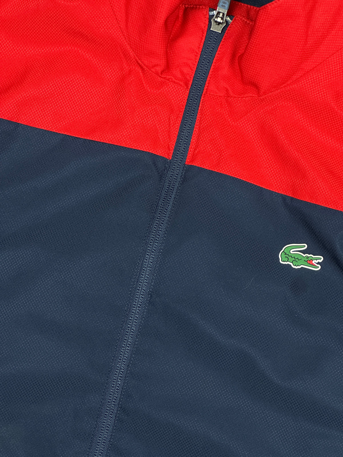 red Lacoste windbreaker {S}