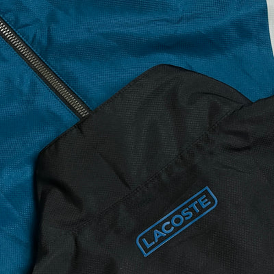 turquoise Lacoste windbreaker {L}