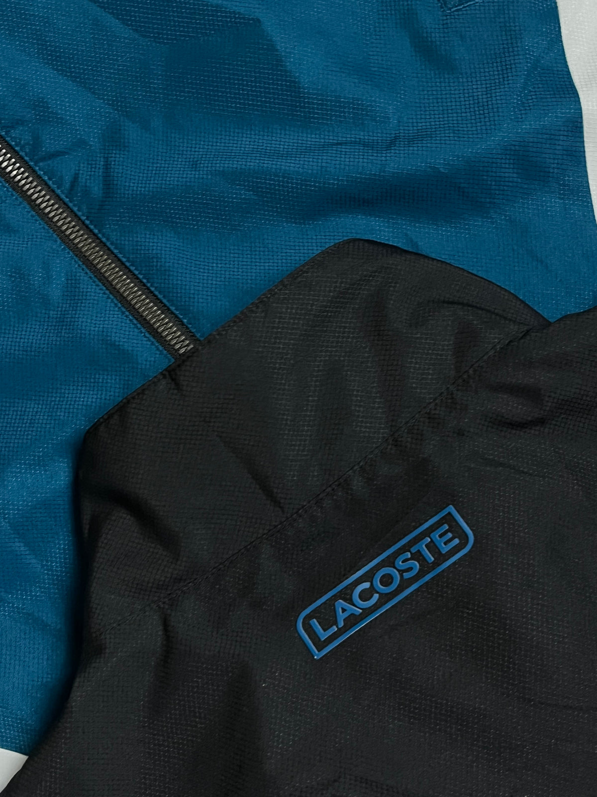 turquoise Lacoste windbreaker {L}