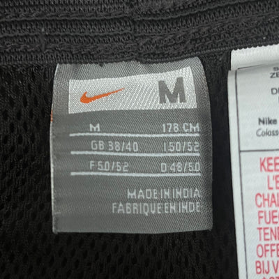 vintage brown Nike trackpants {M}