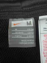 Load image into Gallery viewer, vintage brown Nike trackpants {M}
