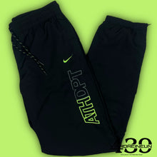 Load image into Gallery viewer, vintage Nike trackpants {M}
