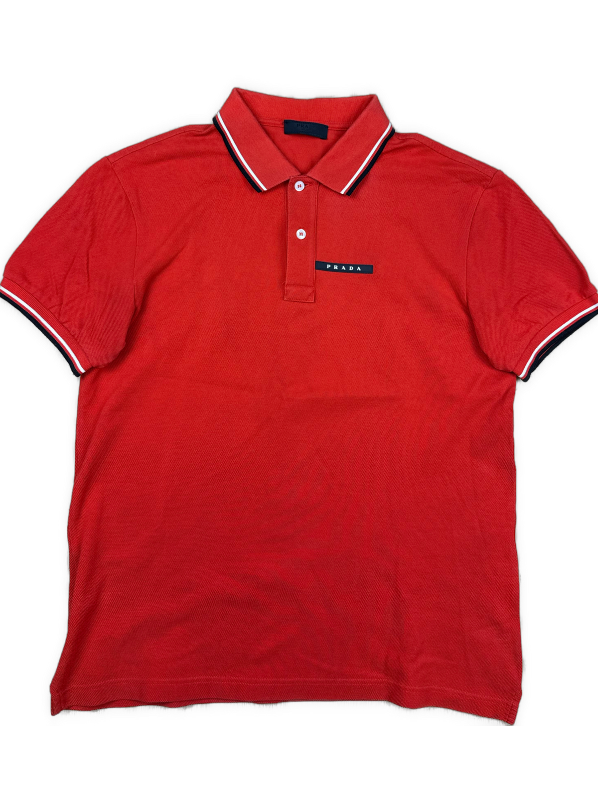 orange Prada polo {M}