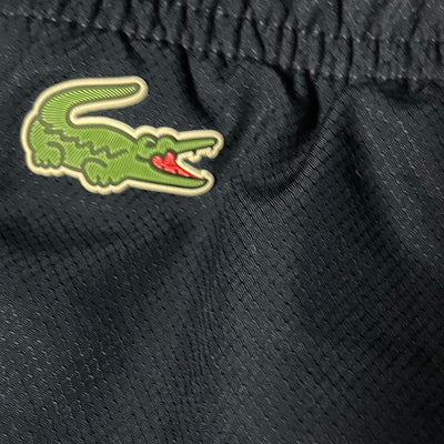 navyblue Lacoste trackpants {S}