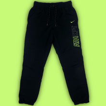 Load image into Gallery viewer, vintage Nike trackpants {M}
