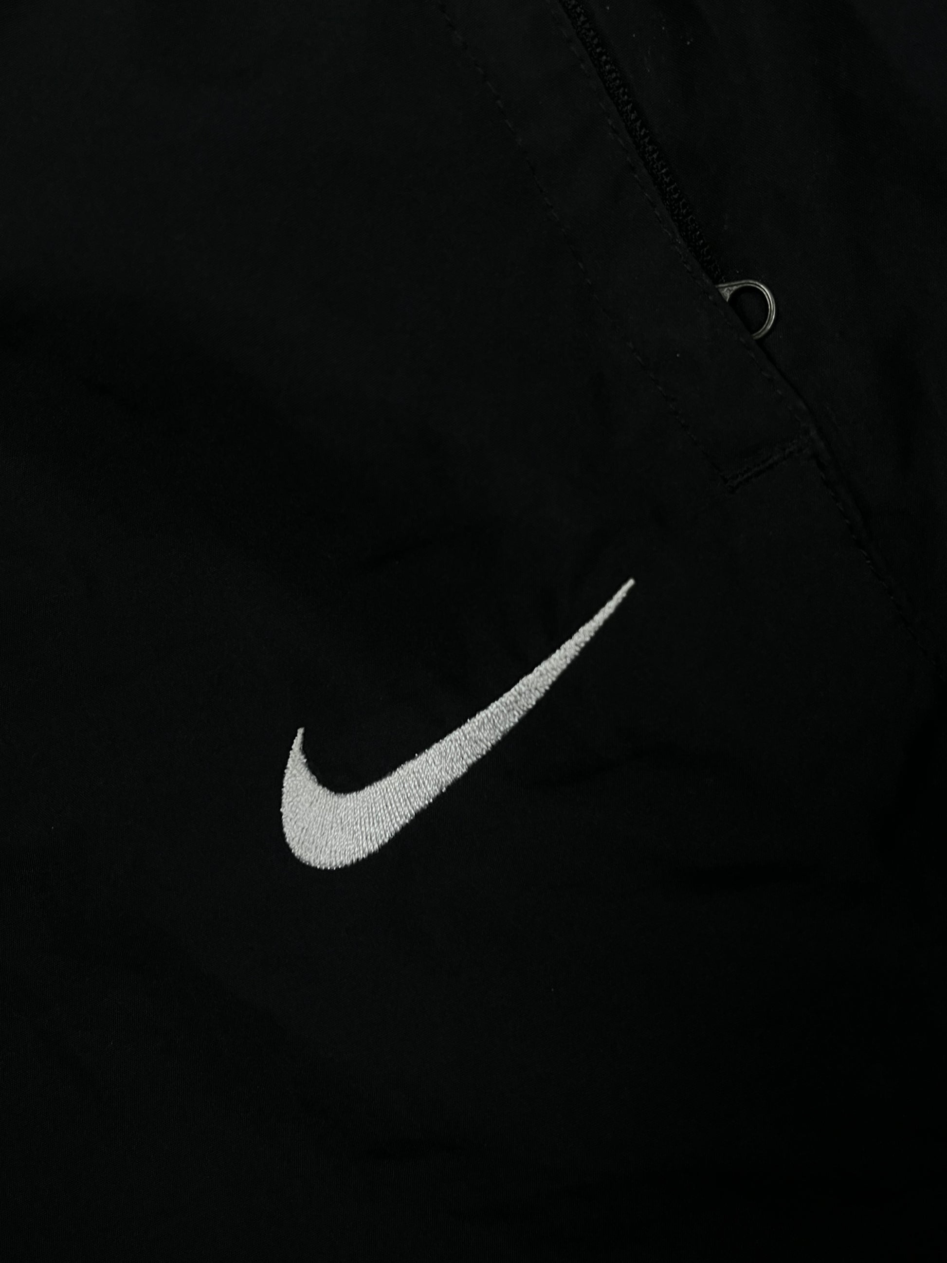 vintage Nike trackpants {L}