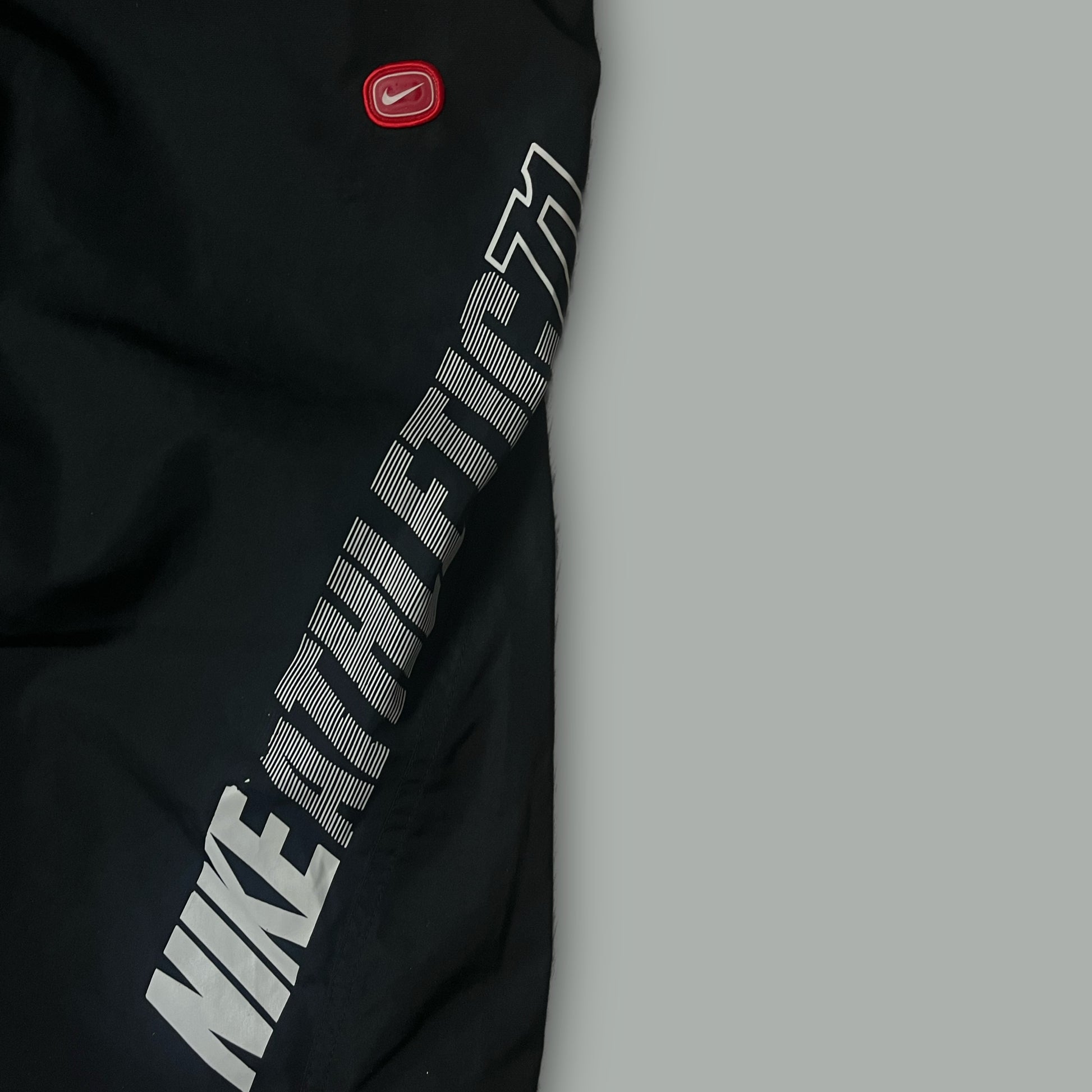 vintage Nike trackpants {M}