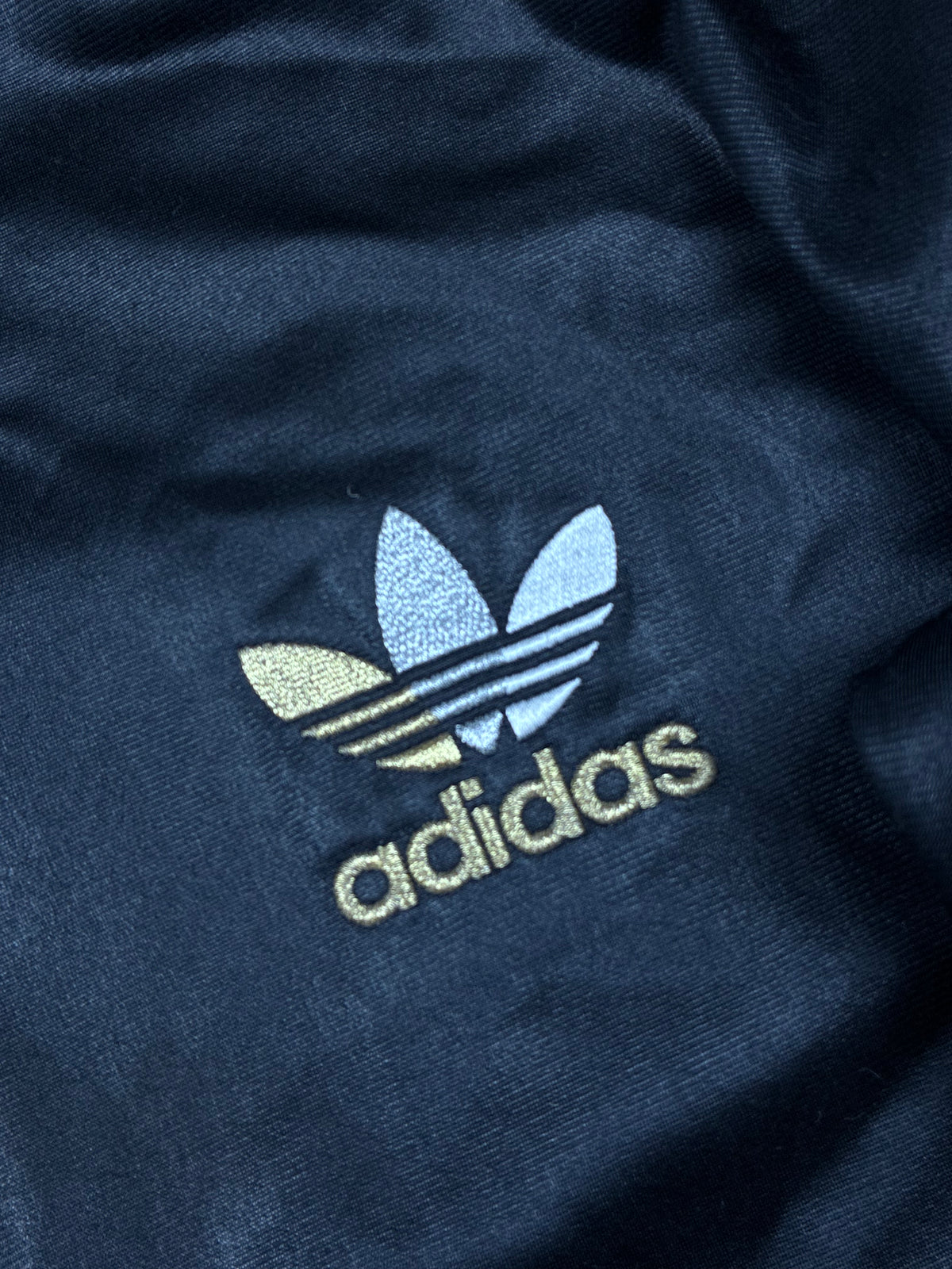 vintage Adidas firebird trackjacket wet look {L}