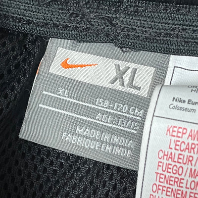 vintage Nike Manchester United trackpants {S}
