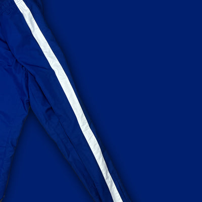 blue Lacoste trackpants {S}