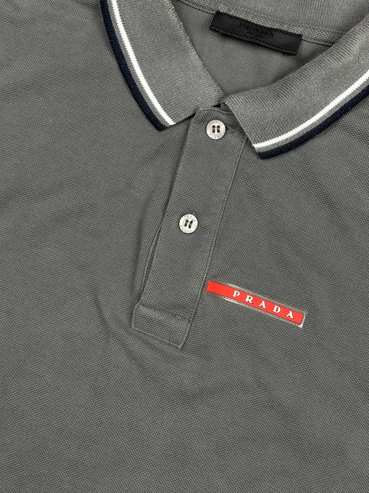 grey Prada polo {M}
