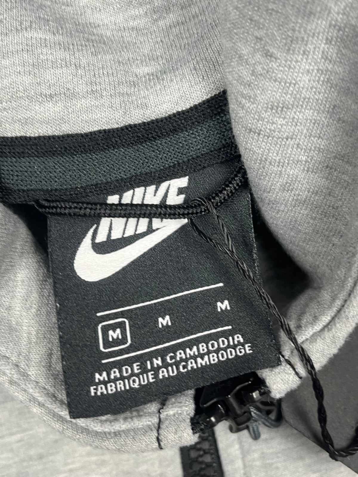 grey Nike Herta tech fleecejacket {M}
