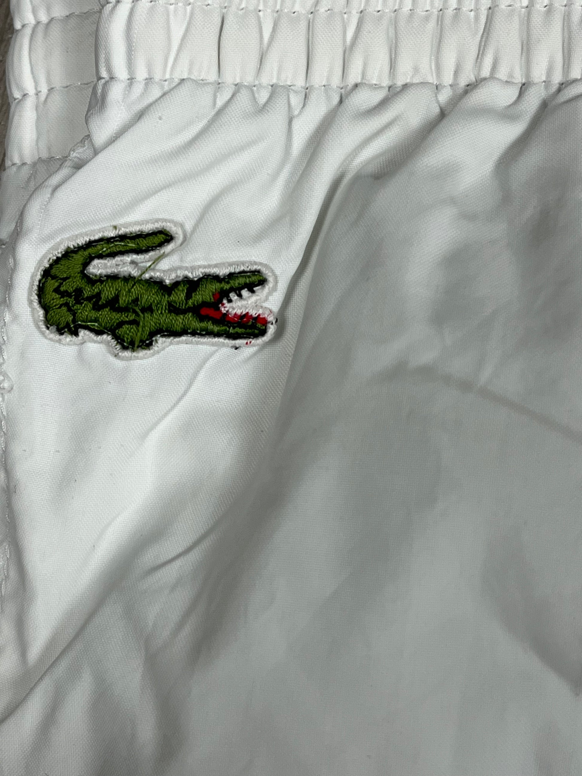 vintage white Lacoste trackpants {XL}