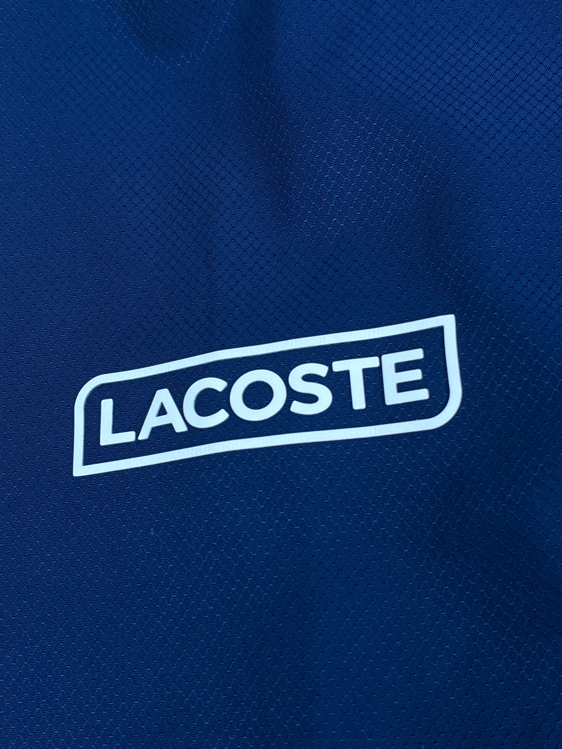 navyblue Lacoste windbreaker {S}