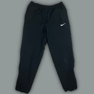 vintage Nike trackpants {M}