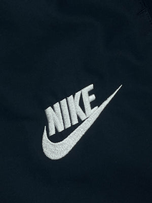 vintage Nike trackpants {L}