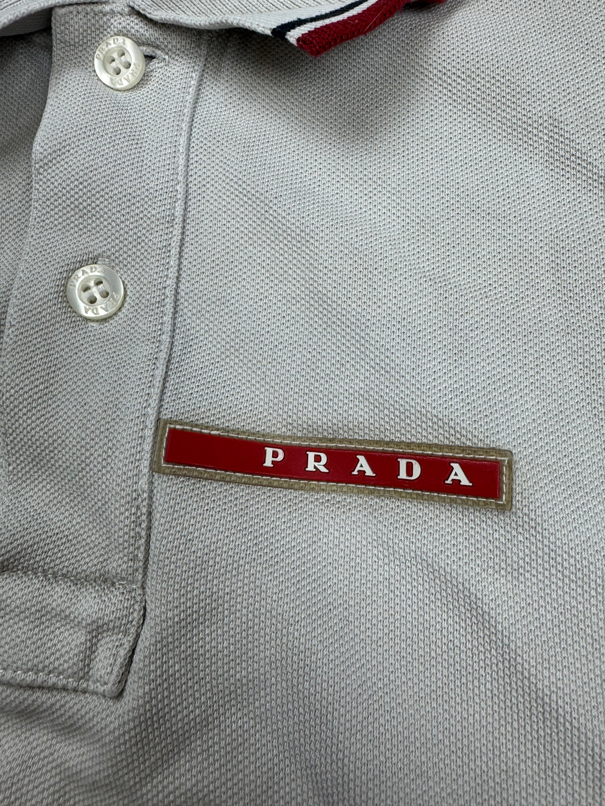 white Prada polo {L}