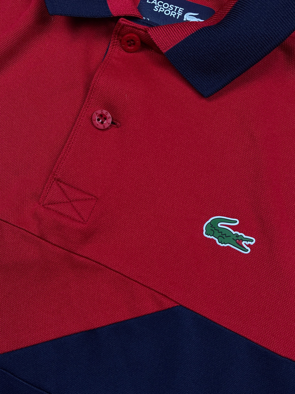 red Lacoste polo {XS}
