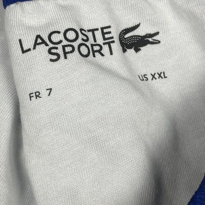 blue Lacoste trackpants {S}