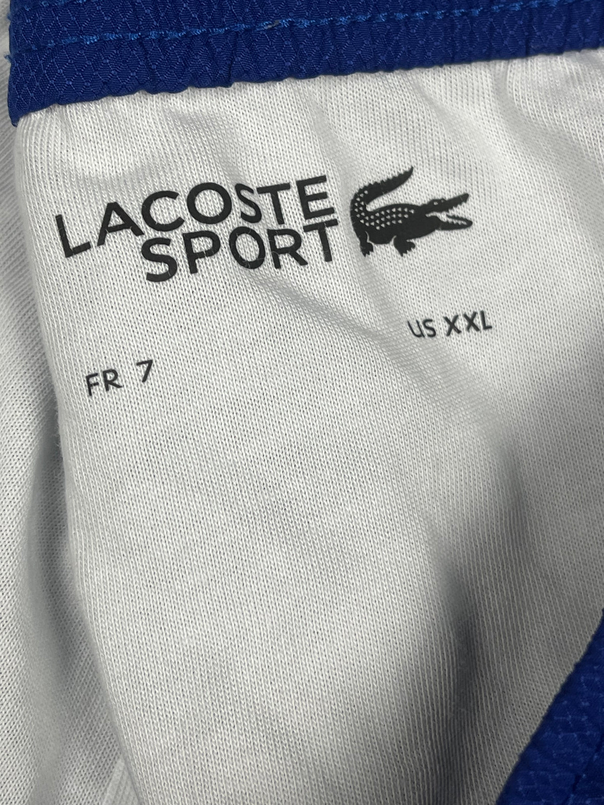 blue Lacoste trackpants {S}