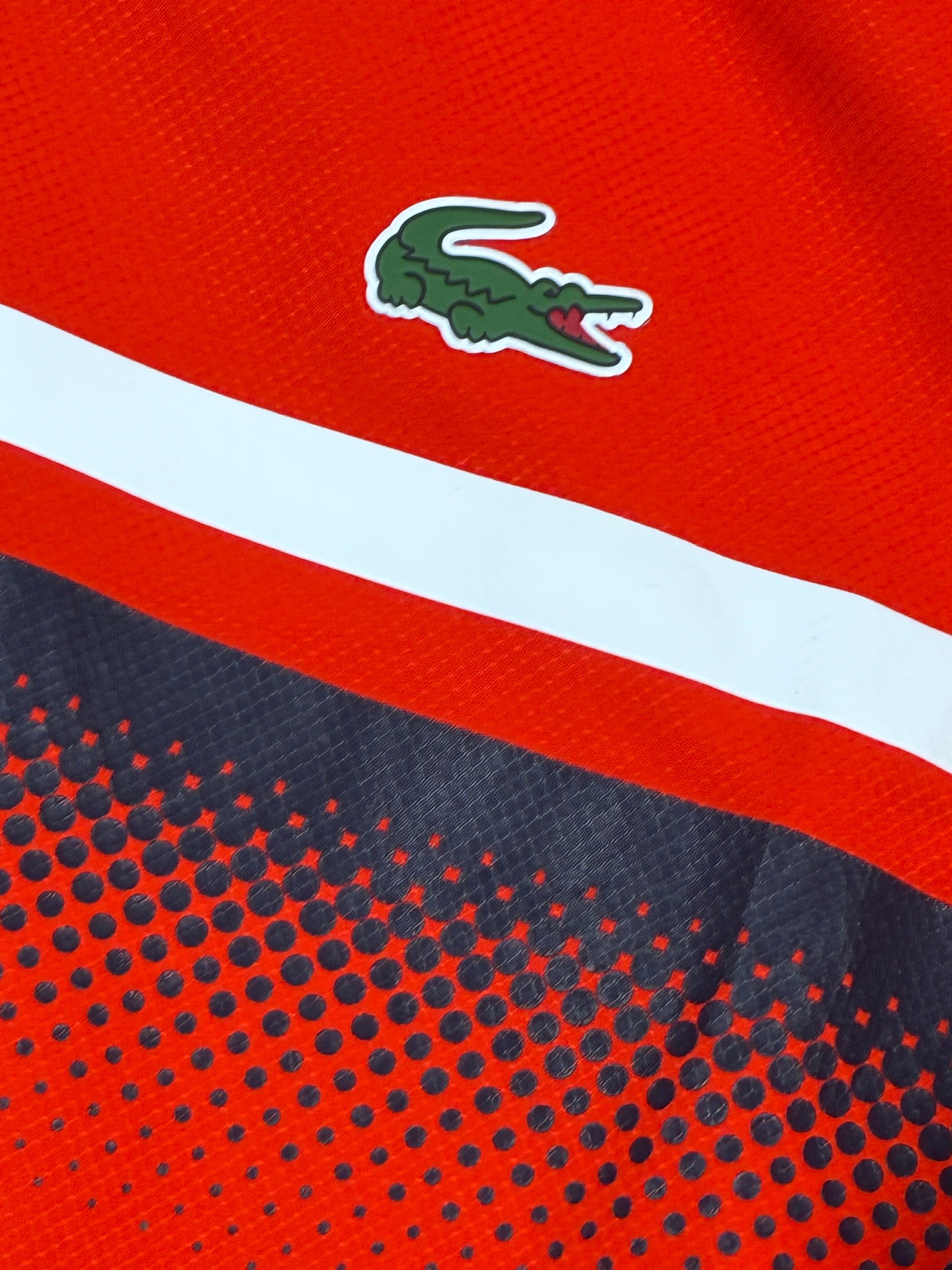 orange Lacoste windbreaker {S}