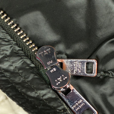 dark green Prada pufferjacket {XS}