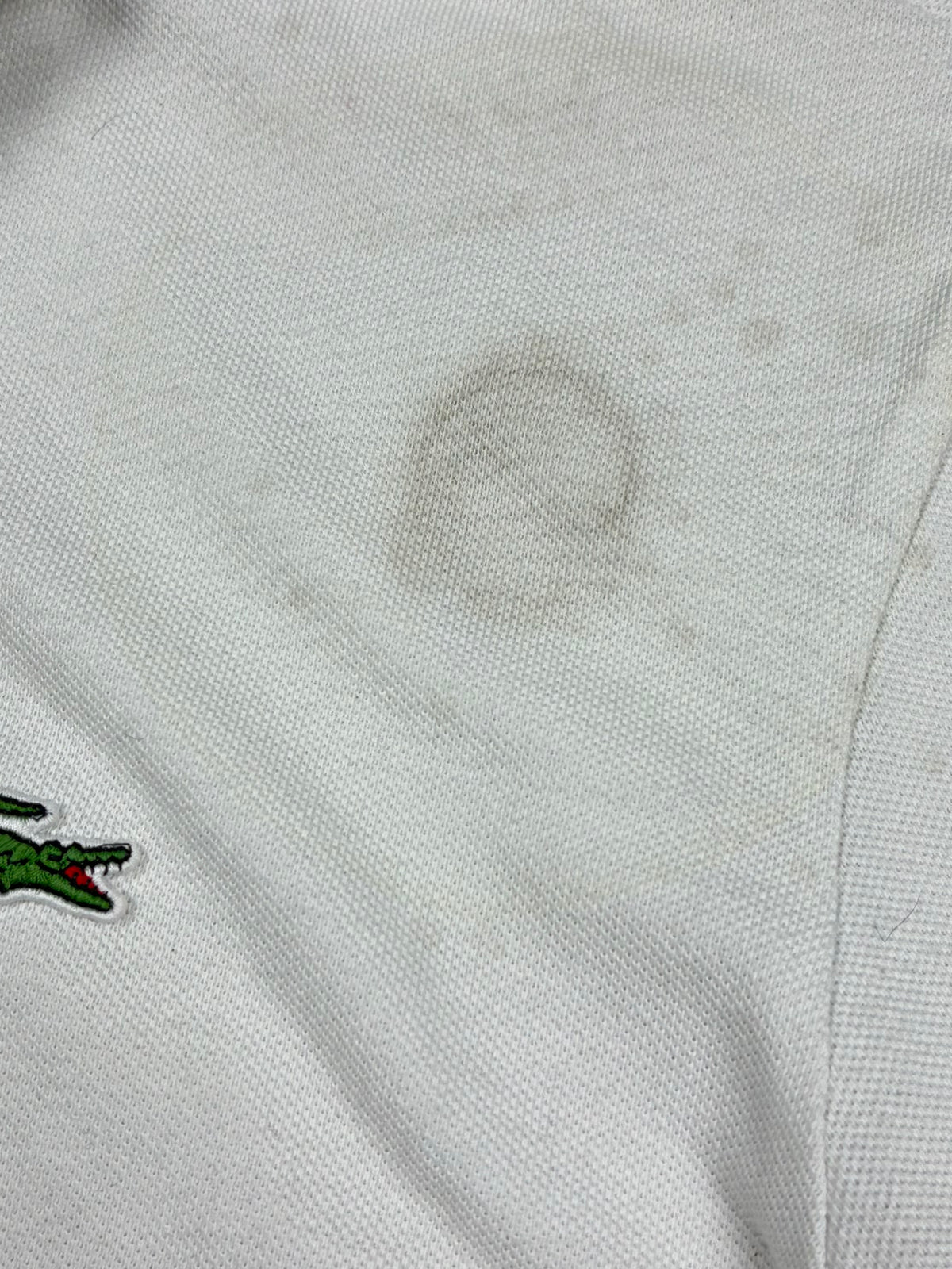 white Lacoste polo {L}