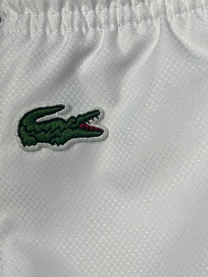 white Lacoste trackpants {M}