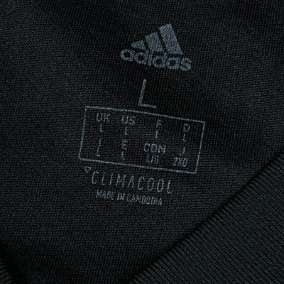 black Adidas Manchester United trainingjersey {L}
