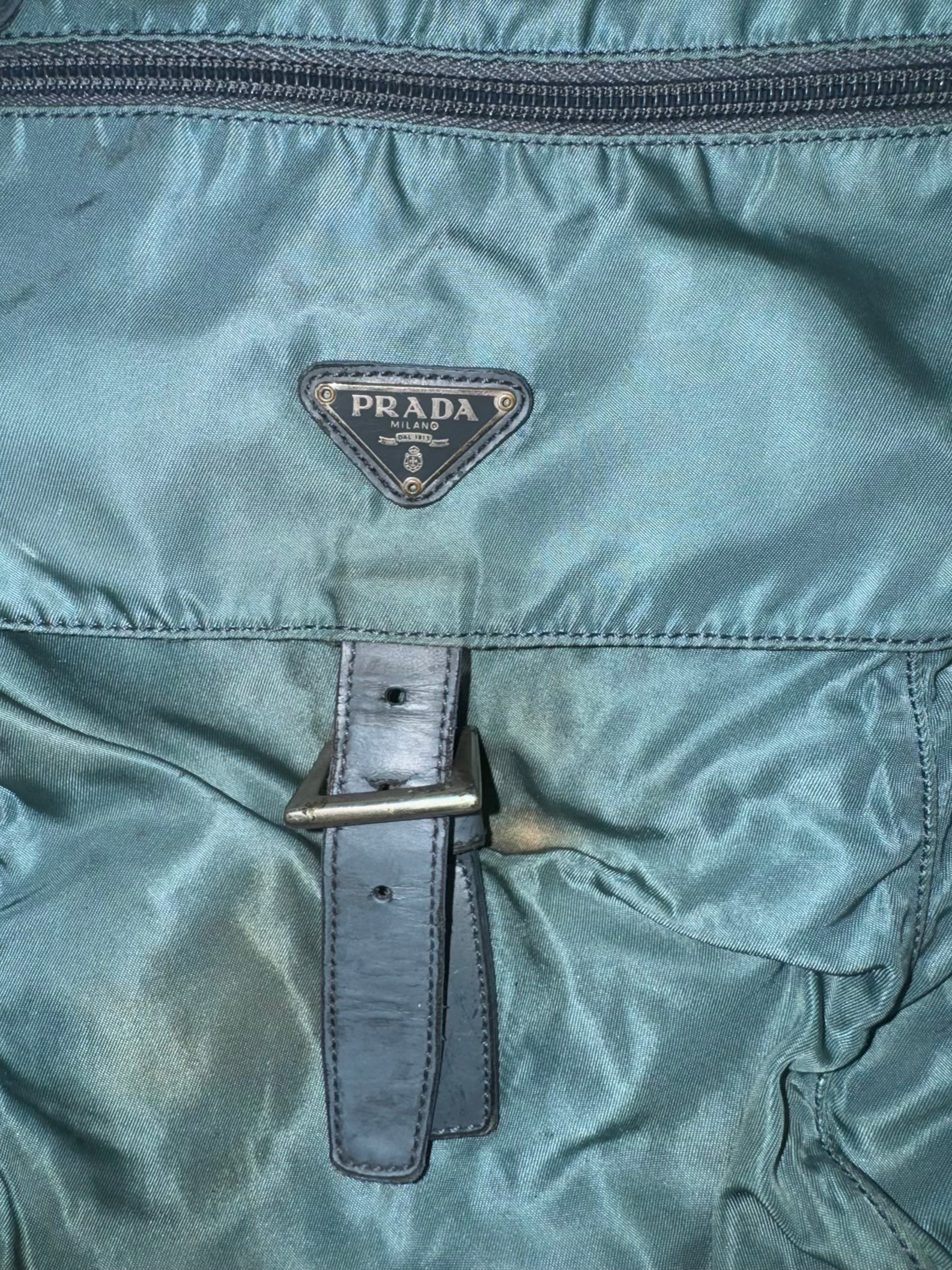 vintage turquoise Prada slingbag