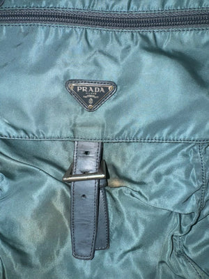 vintage turquoise Prada slingbag