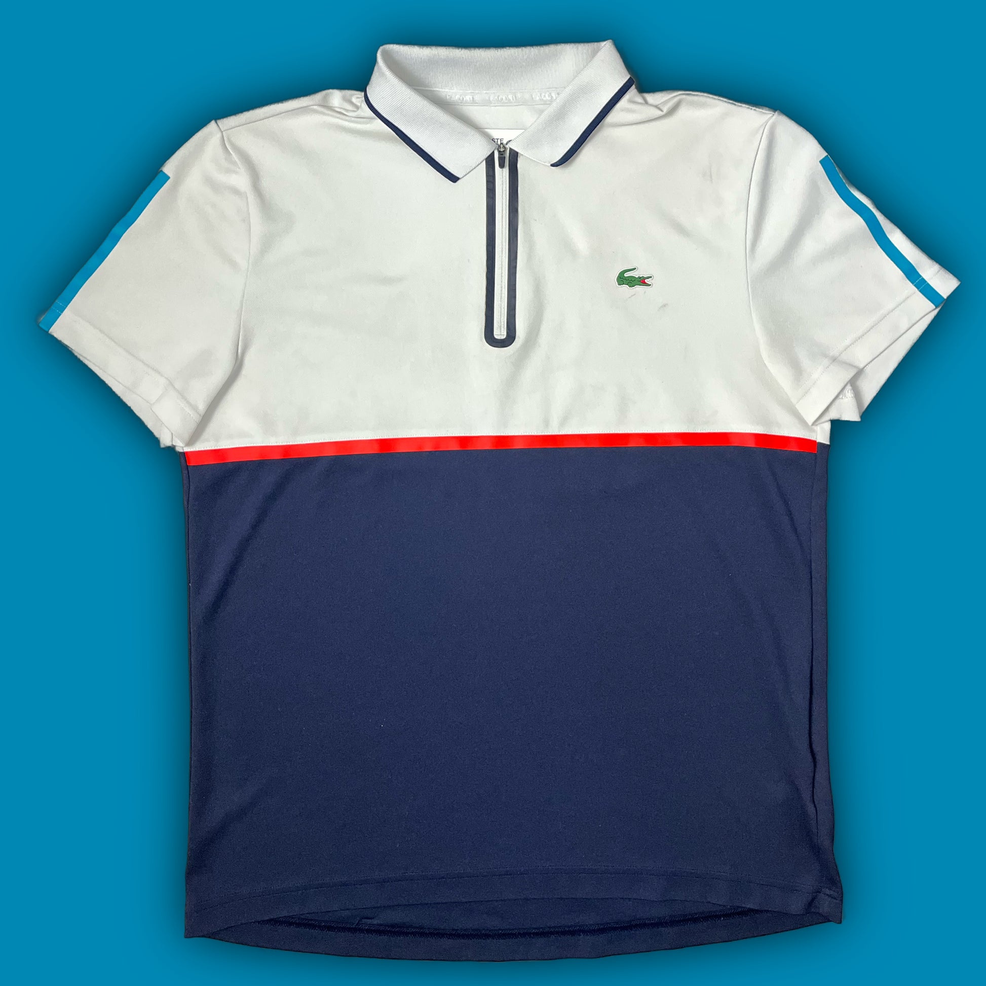 white Lacoste polo {M}