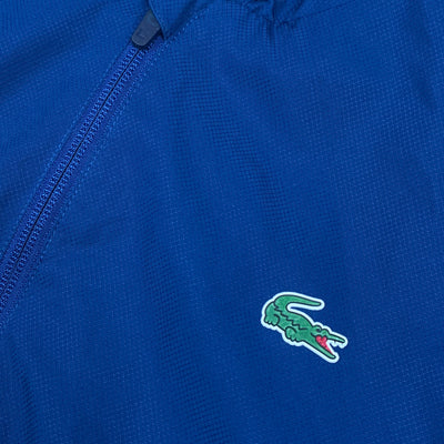 navyblue Lacoste windbreaker {S}