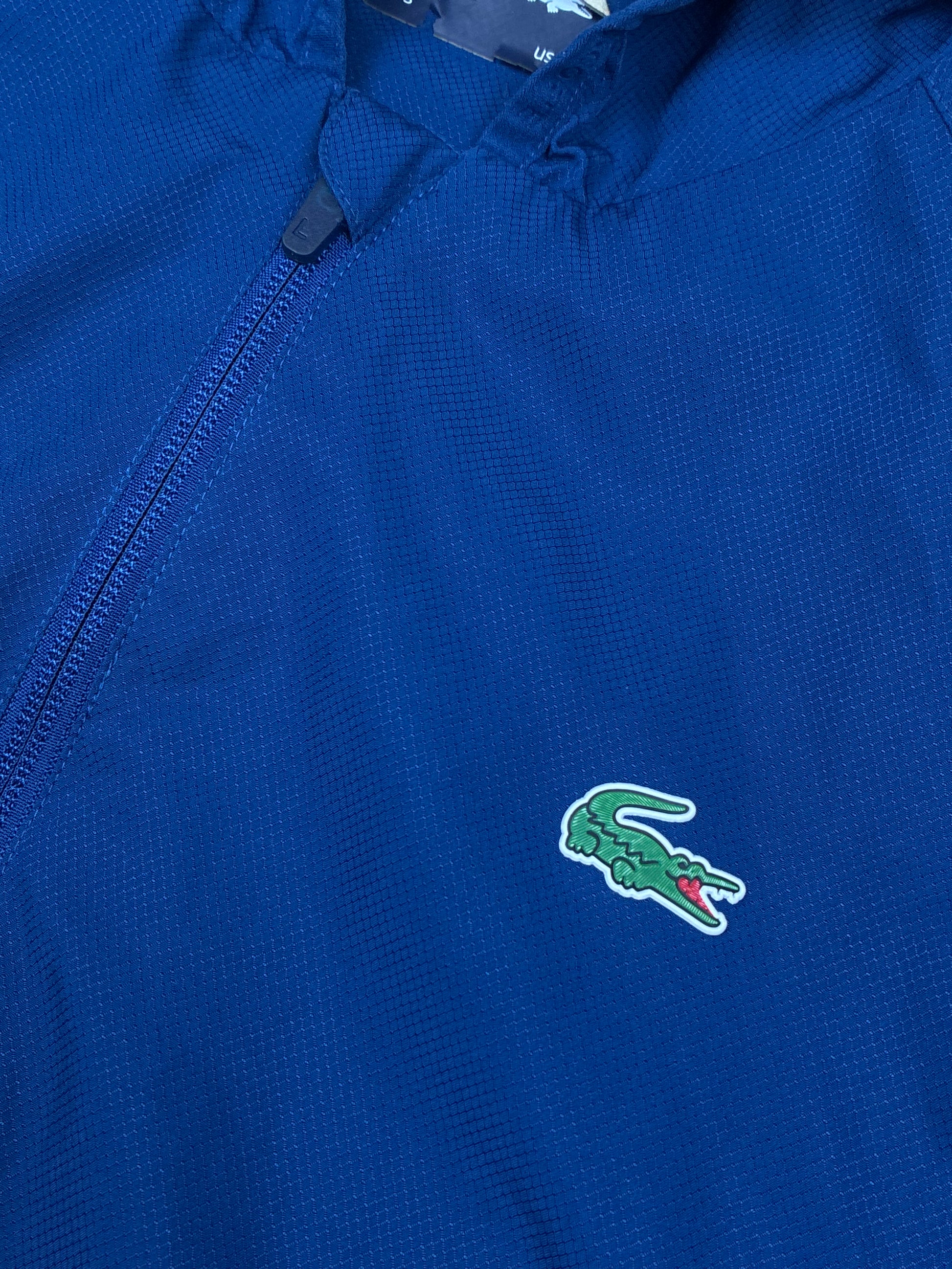 navyblue Lacoste windbreaker {S}