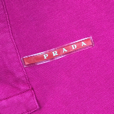 vintage pink Prada polo {M}