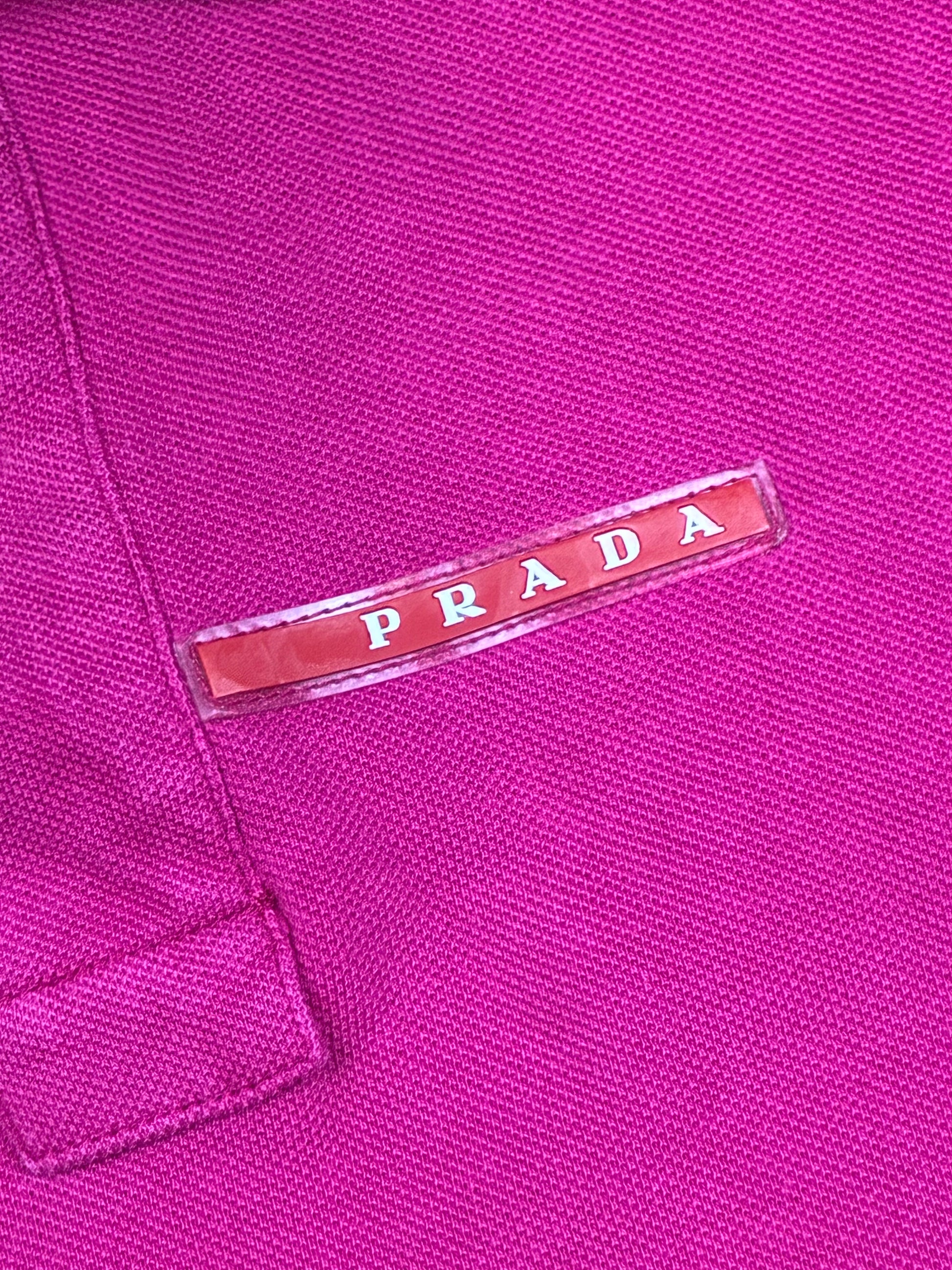 vintage pink Prada polo {M}