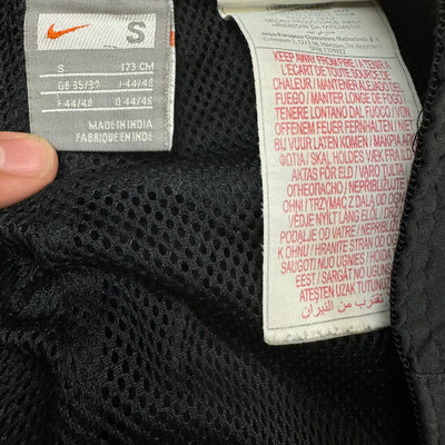 vintage Nike Manchester United trackpants {S}