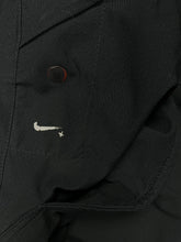 Load image into Gallery viewer, vintage Nike trackpants {M}
