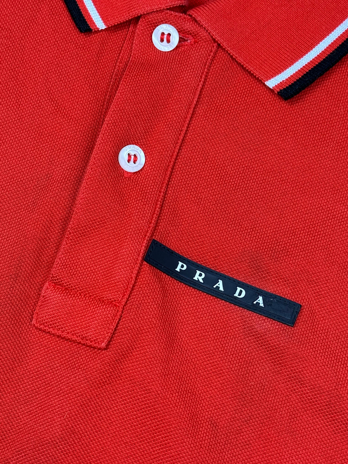 orange Prada polo