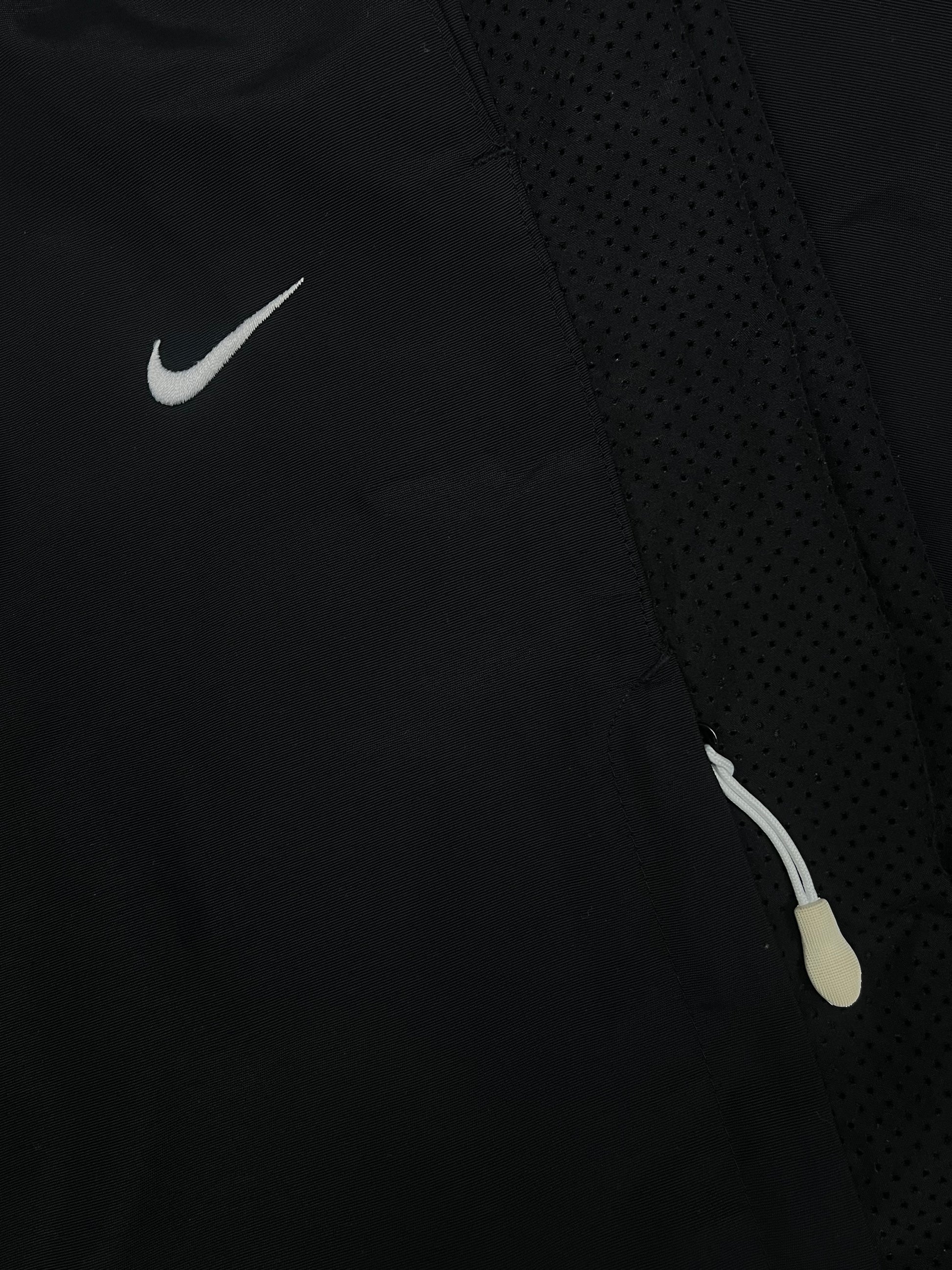 vintage Nike trackpants {L}