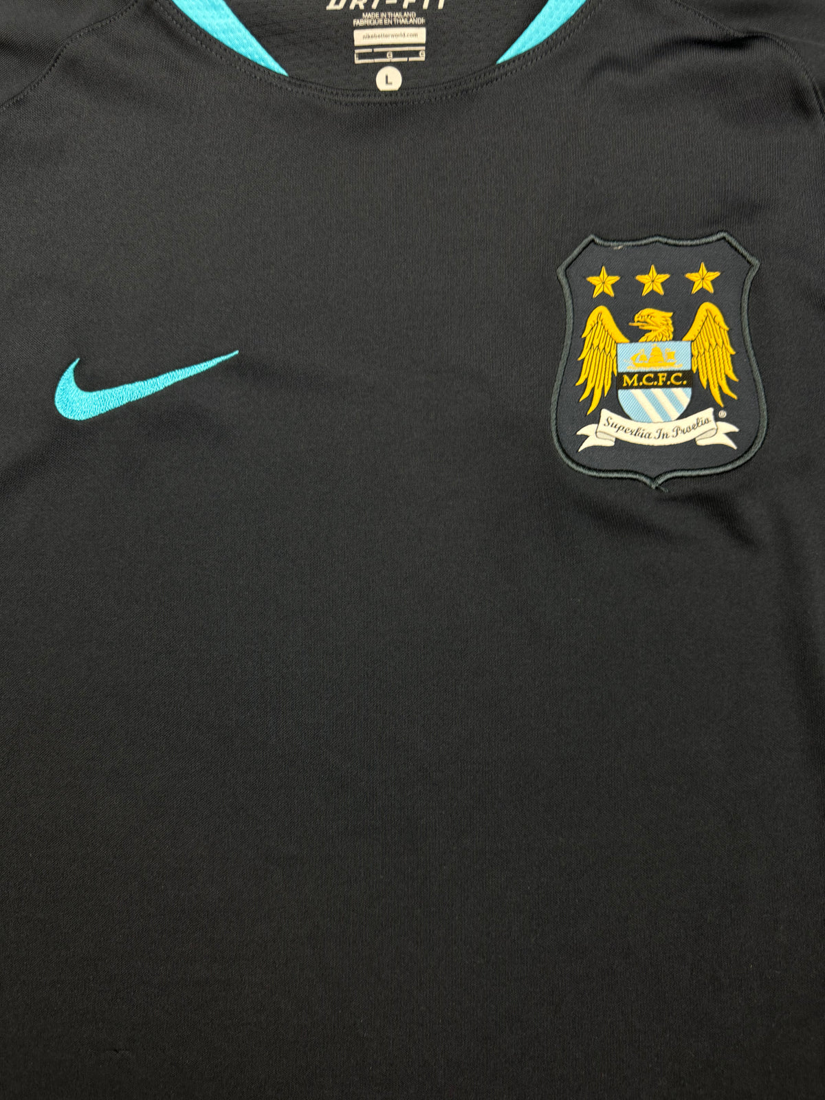 vintage Nike Manchester City trainingjersey {L}