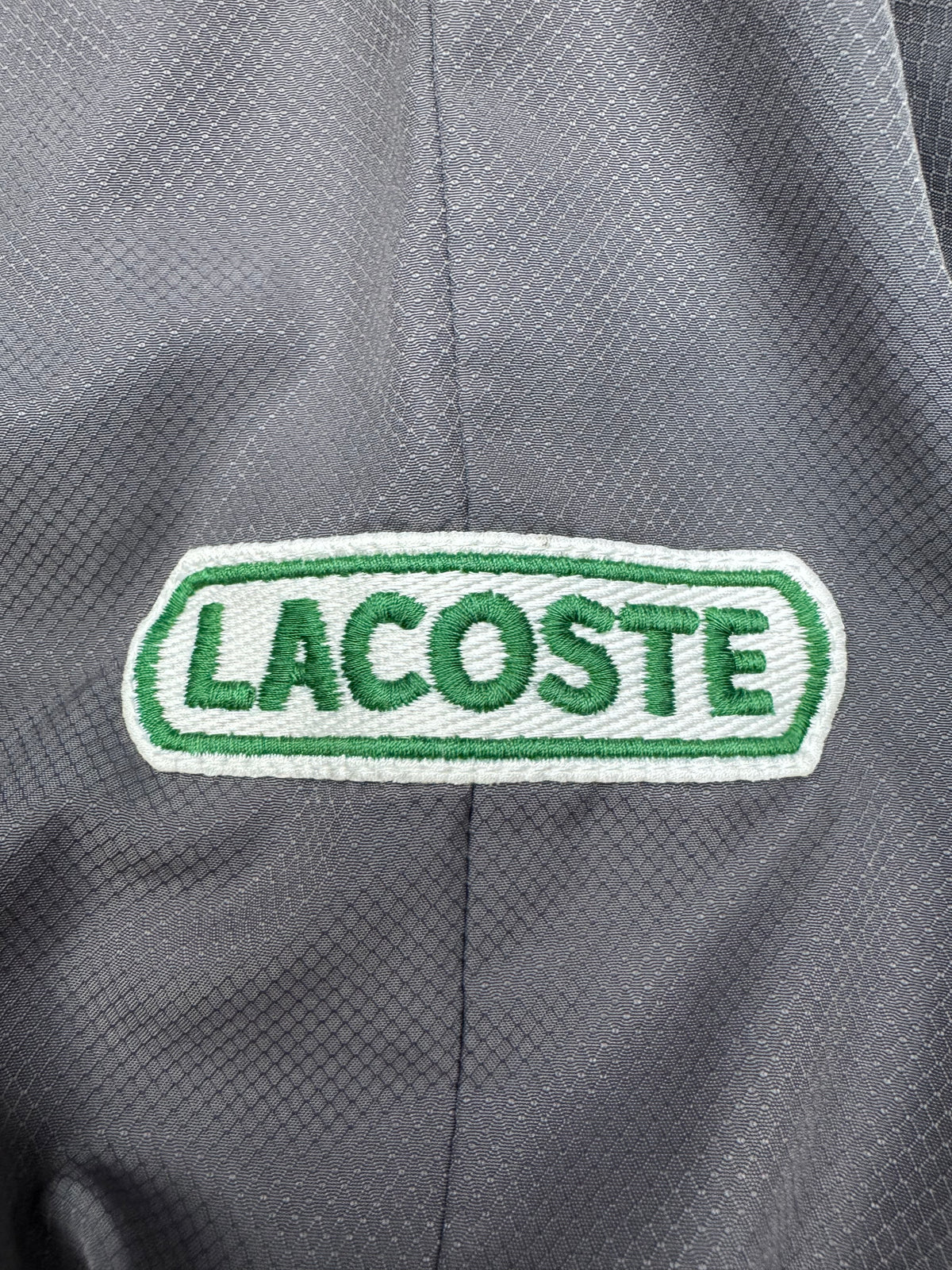 vintage Lacoste windbreaker {L}