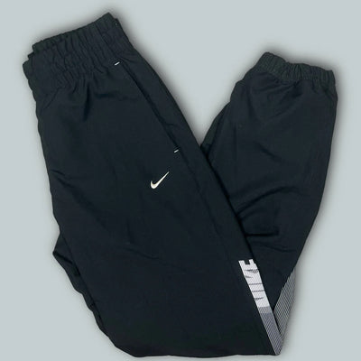 vintage Nike trackpants {M}