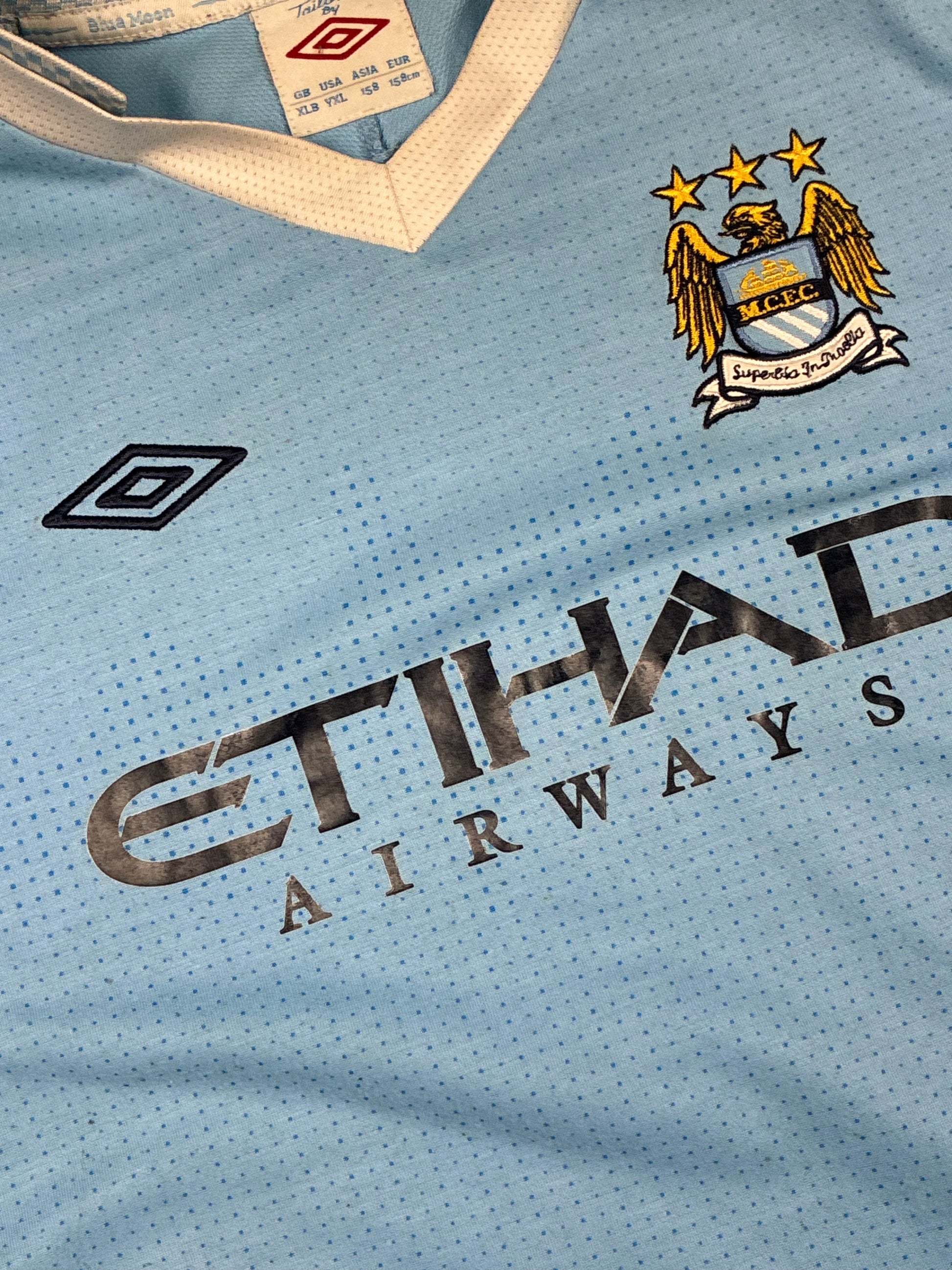 vintage Umbro Manchester City home jersey {S}